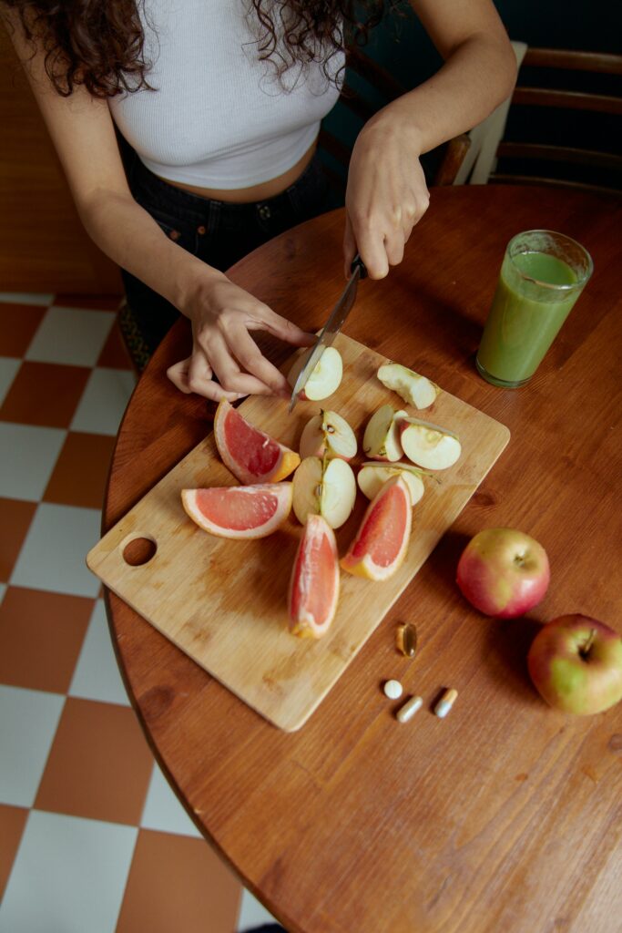 Virginia Woman chopping fruit for a healthy and yummy snack